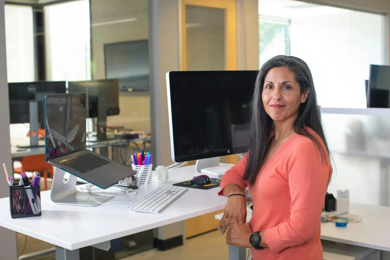 Smiling engineering lead in an office