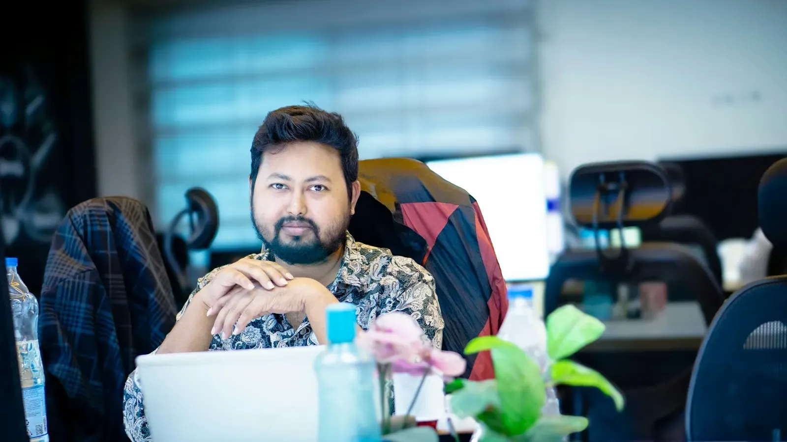 Engineer seated at his desk in an office