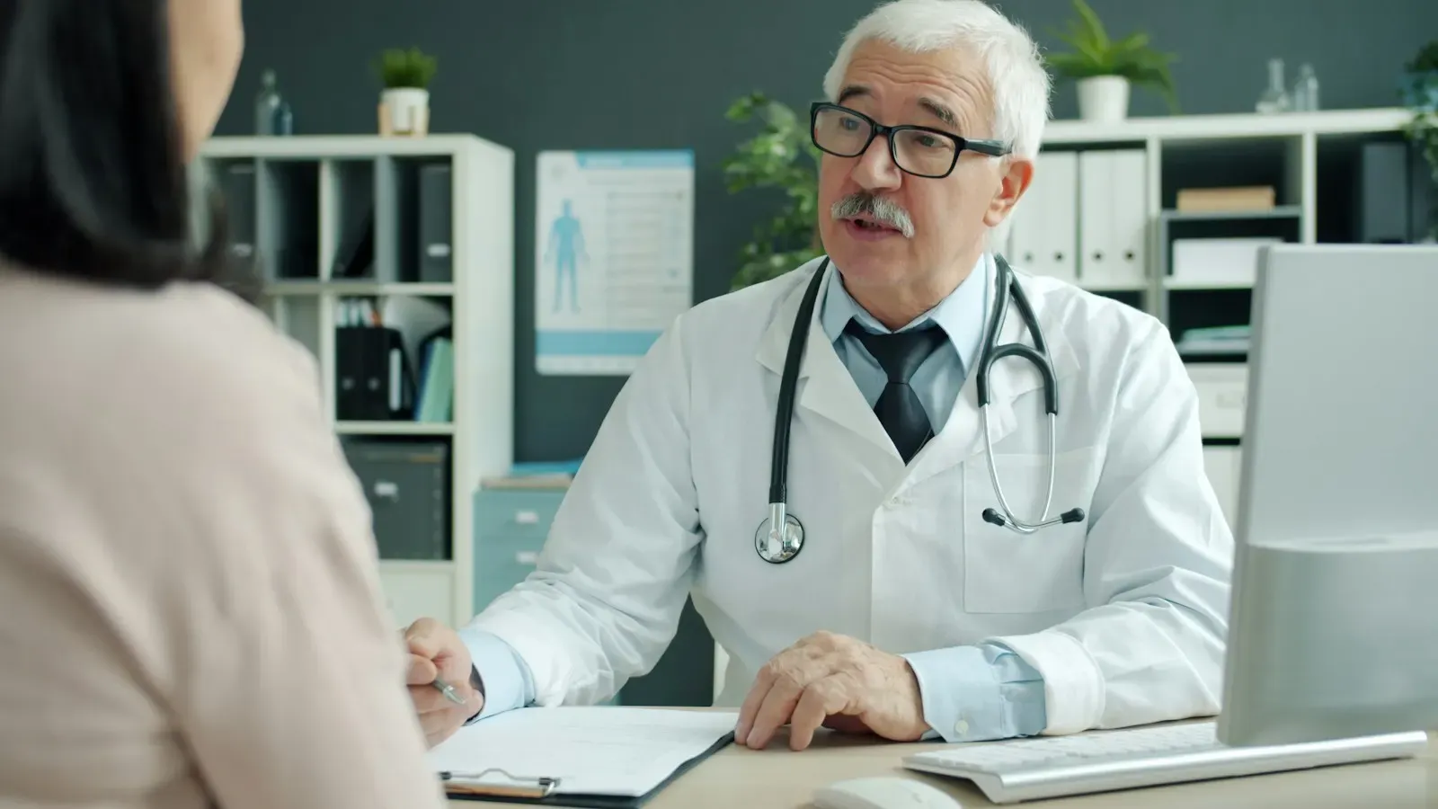 Doctor talking with a patient in an office