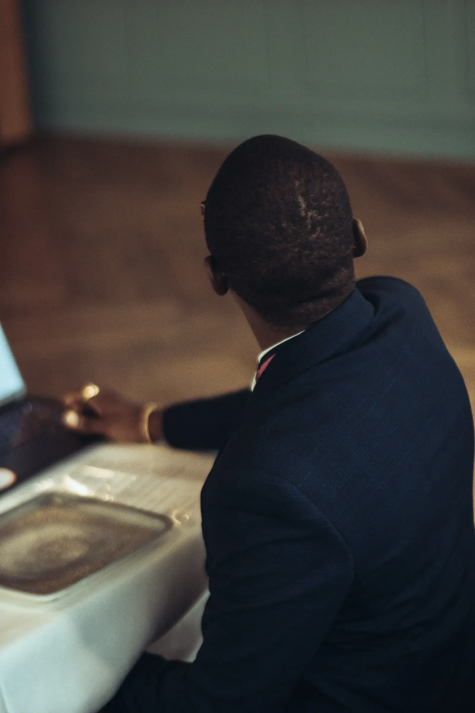 Founder checking an agent's work on his laptop