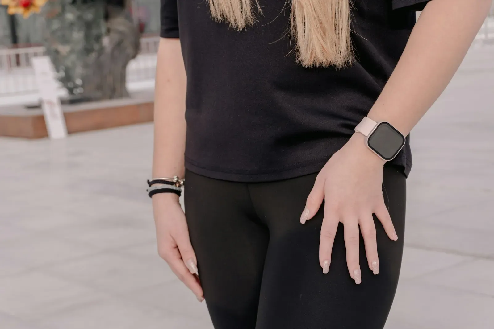 Person in sportswear wearing a smartwatch