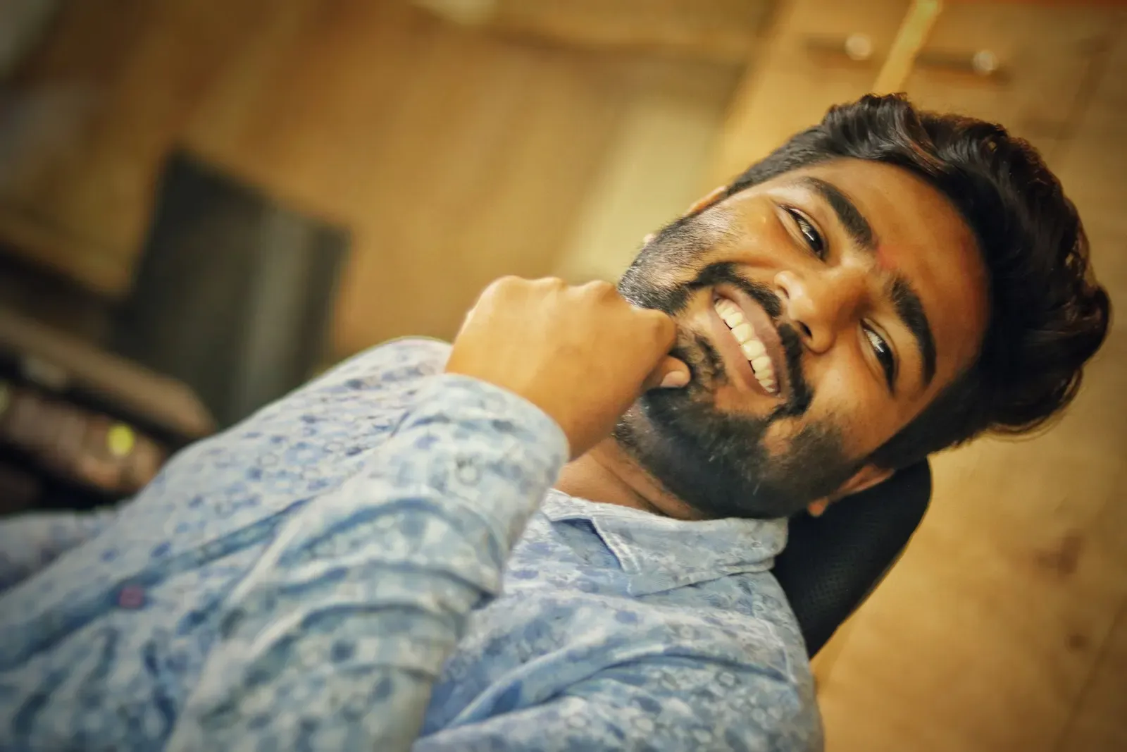 Engineer laughing at his desk