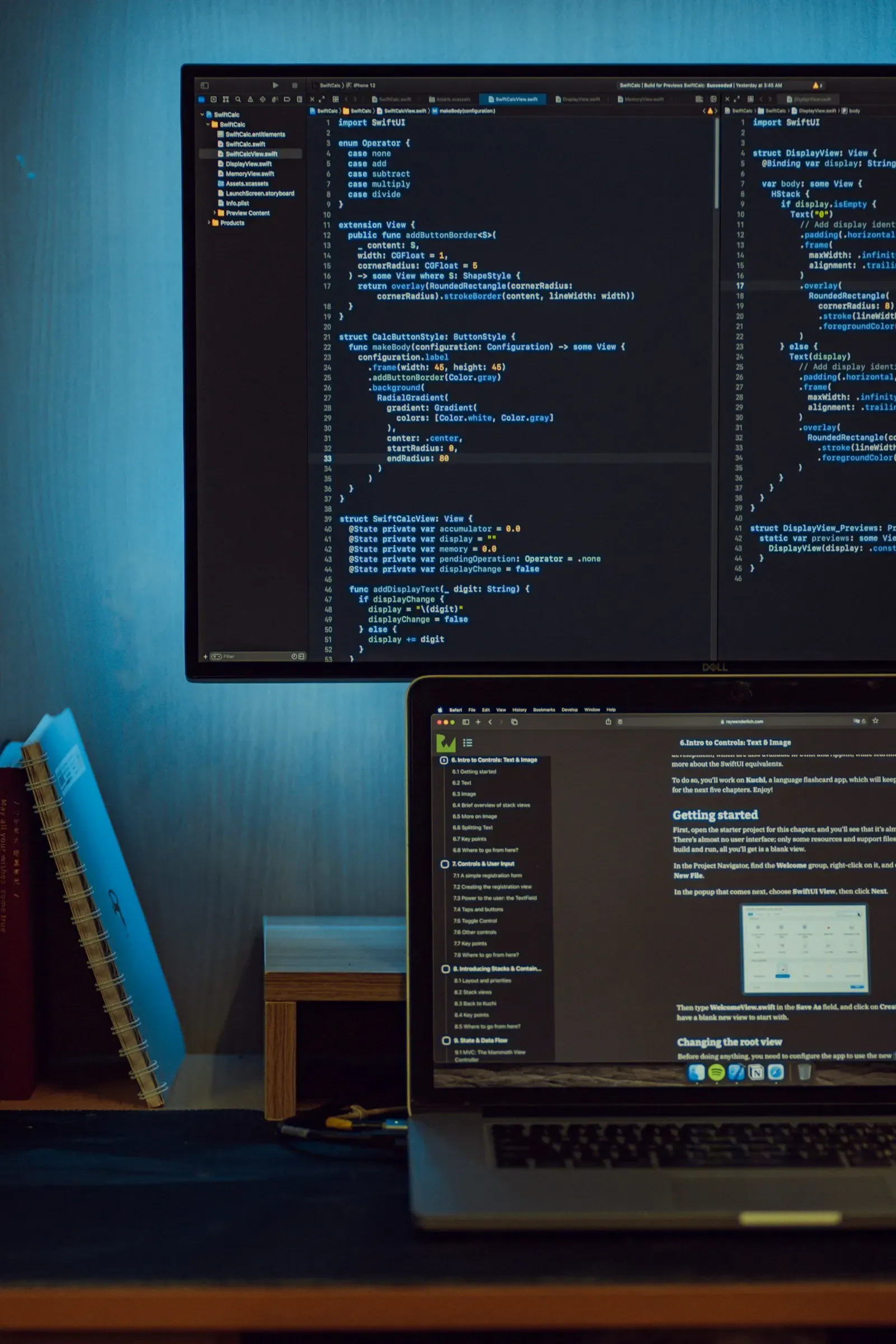 Code for an agent's tools open on a monitor and laptop