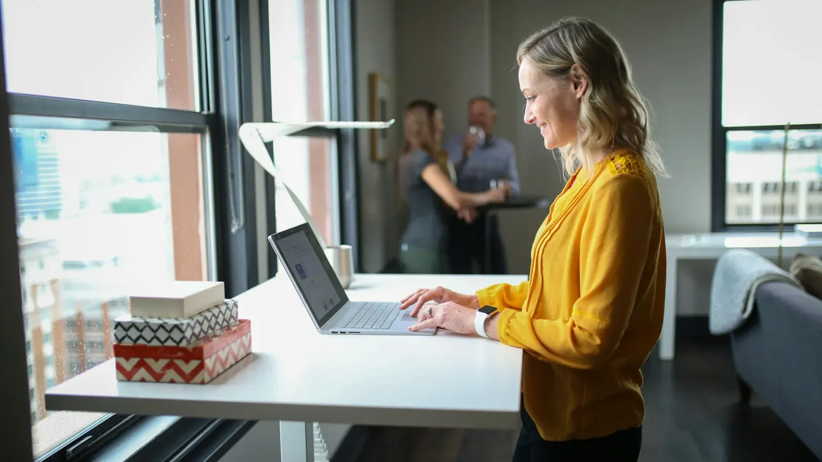 Online seller working at a standing desk
