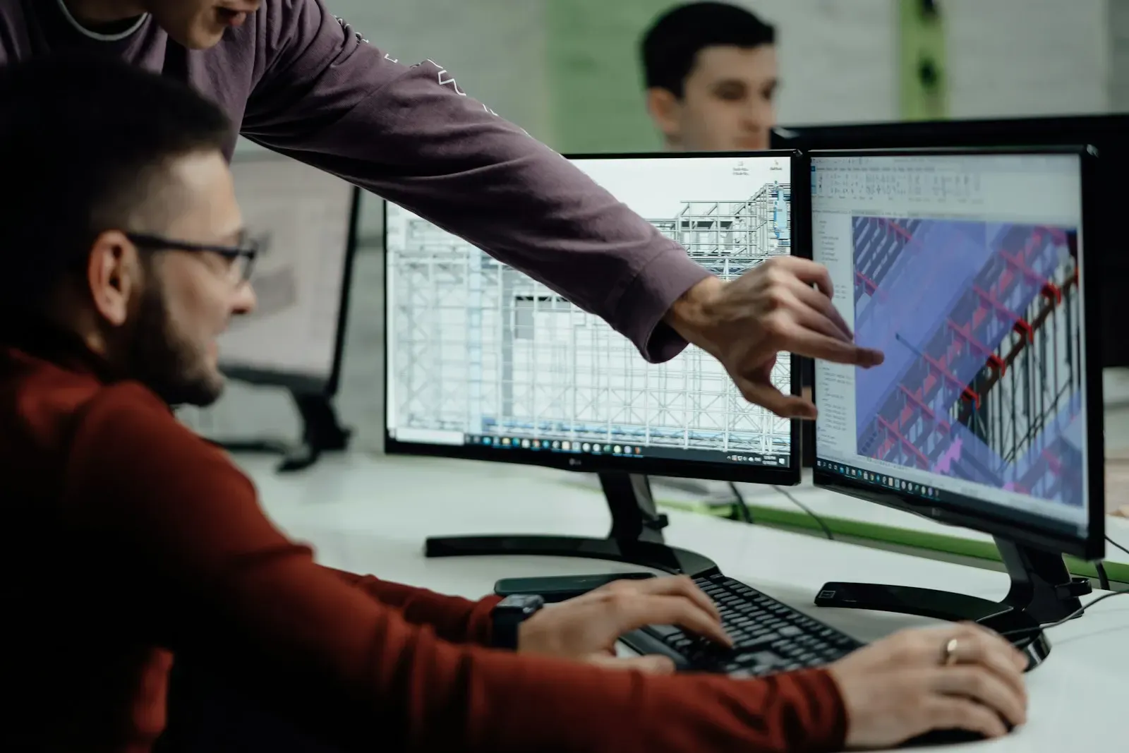 Team reviewing usage data on a large monitor