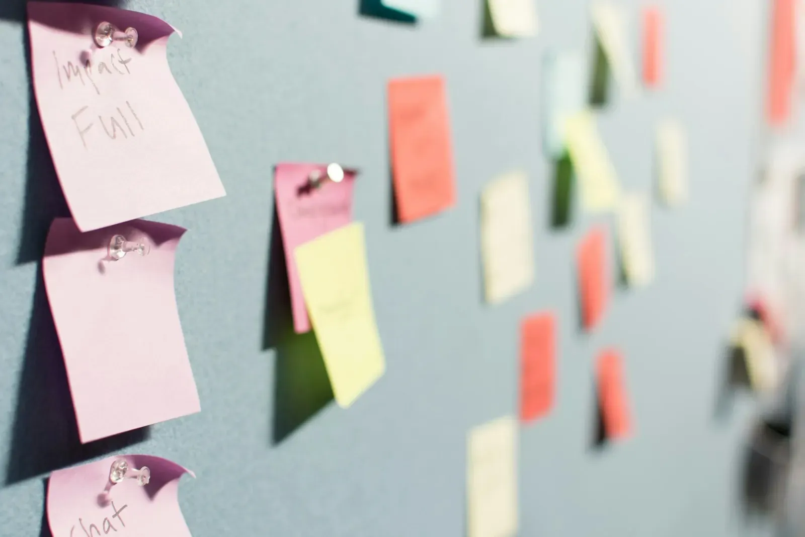 Task cards pinned to a planning board