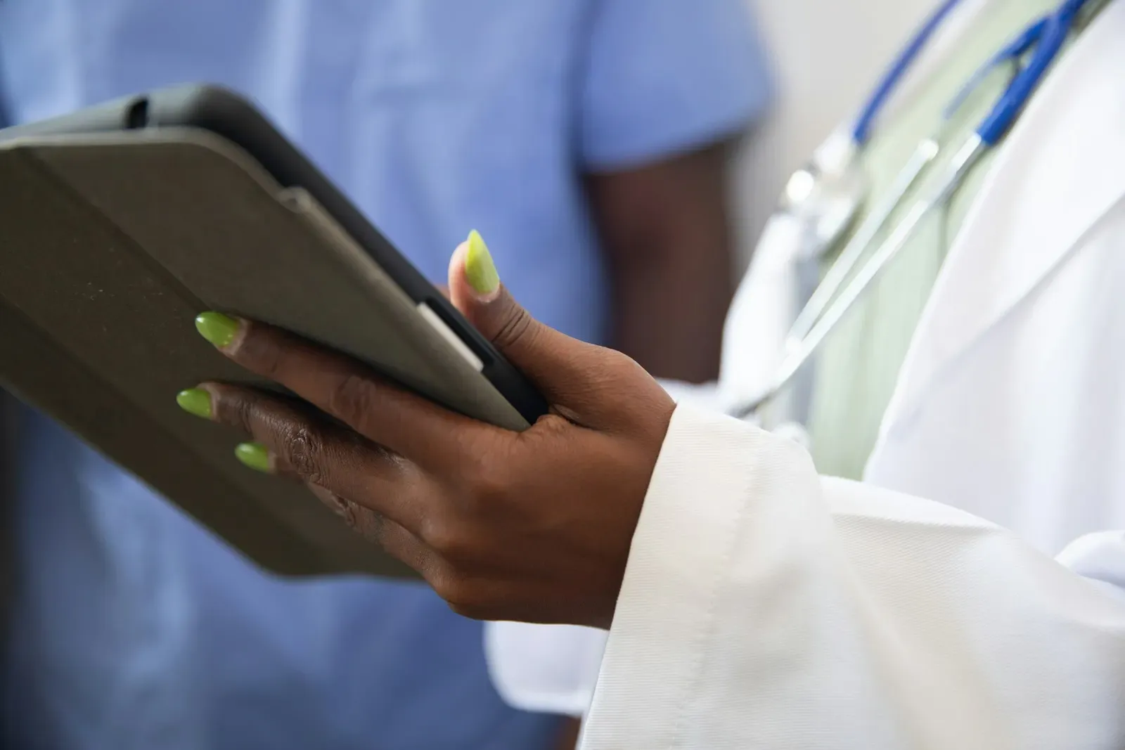 Clinician holding a tablet