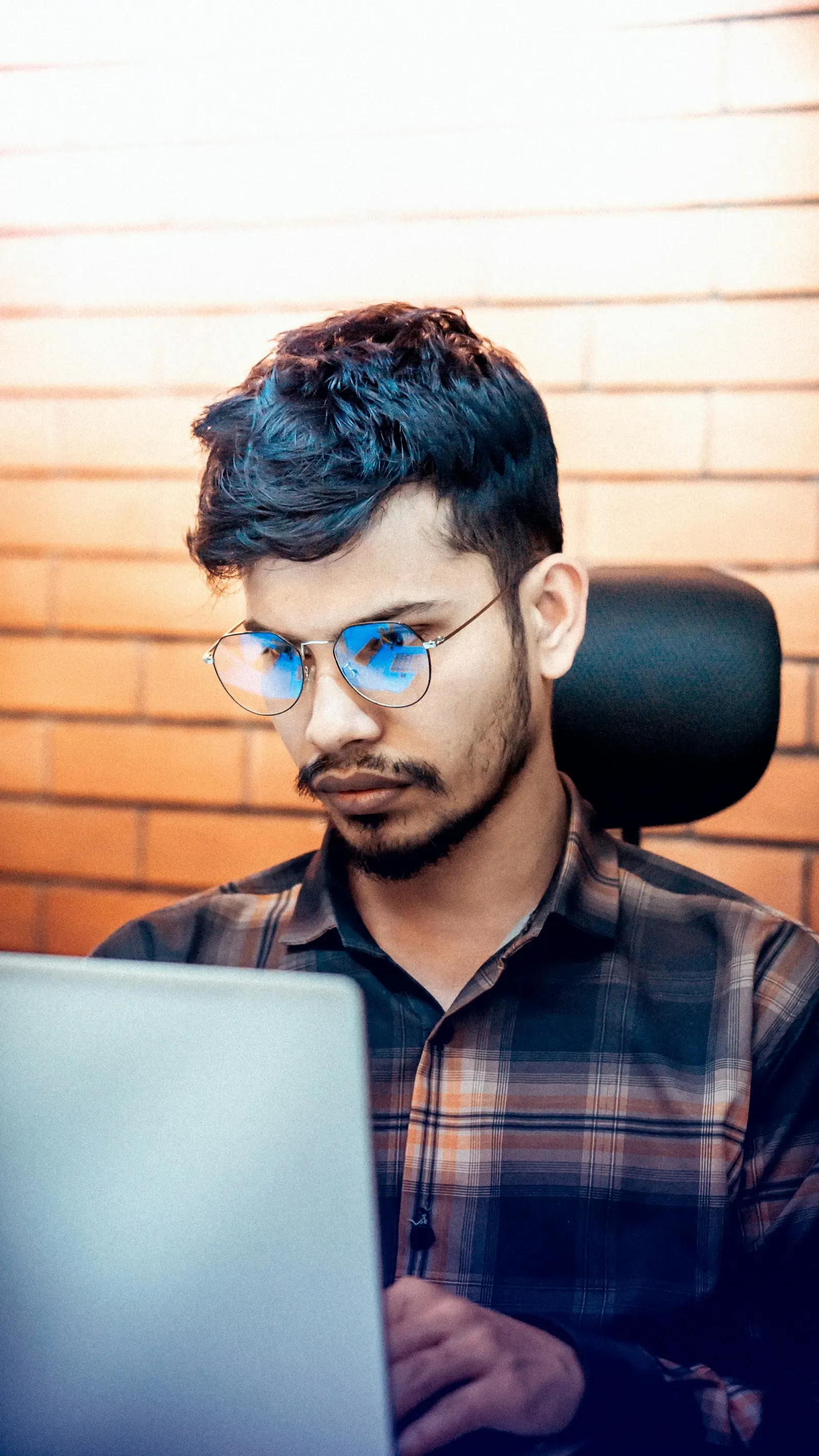 Developer reviewing code at his desk