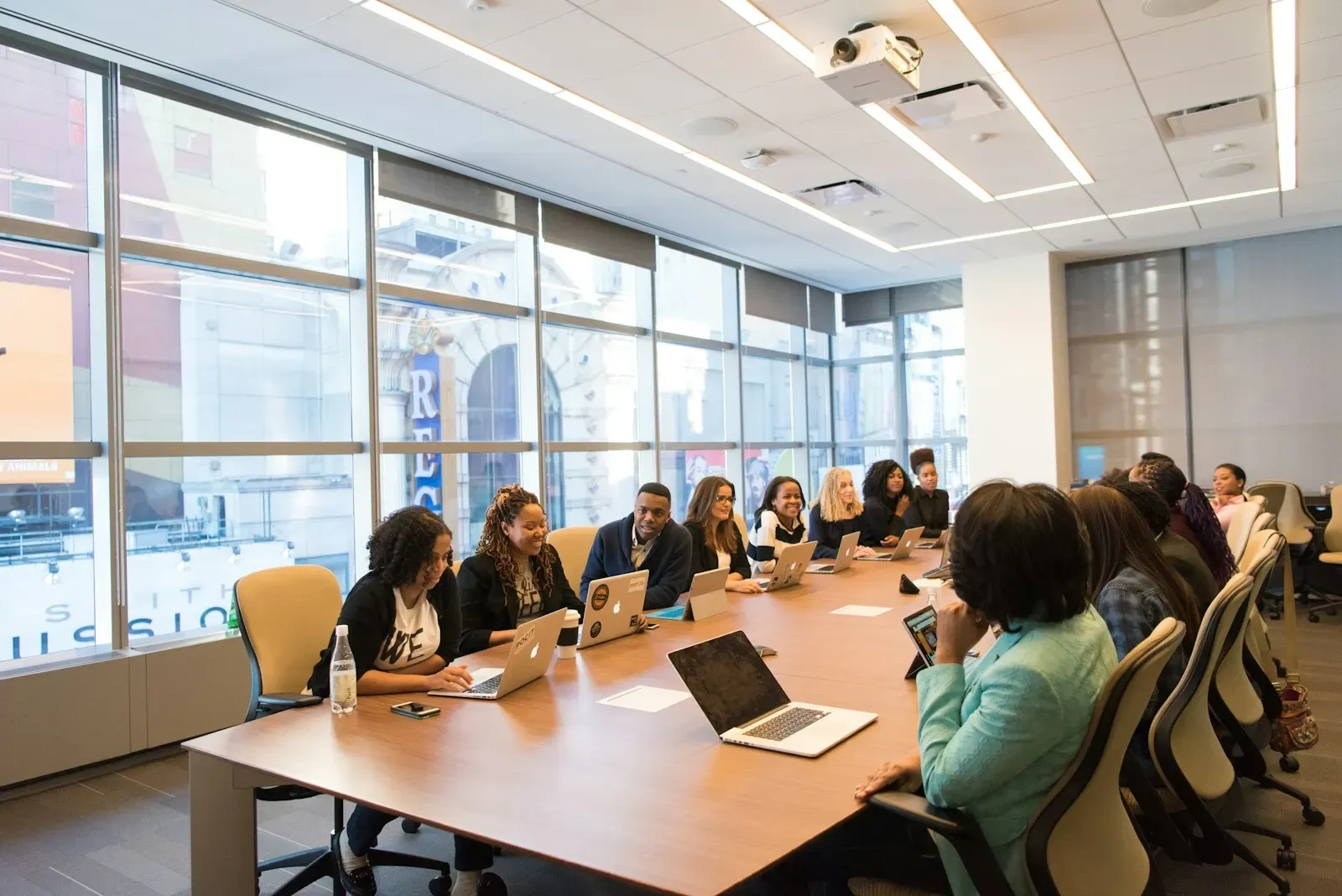 Finance team meeting around a long table