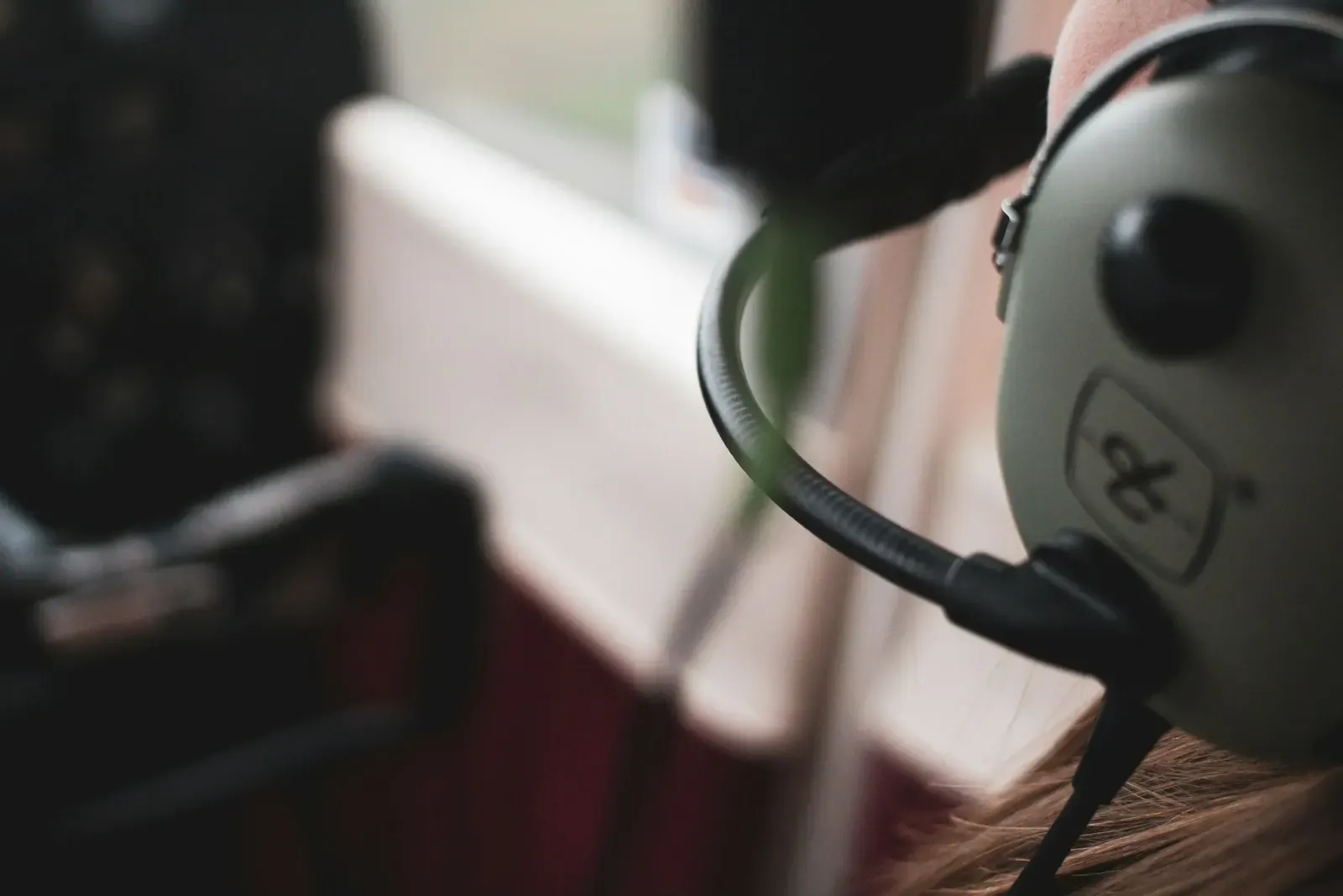 Person wearing a headset on a call