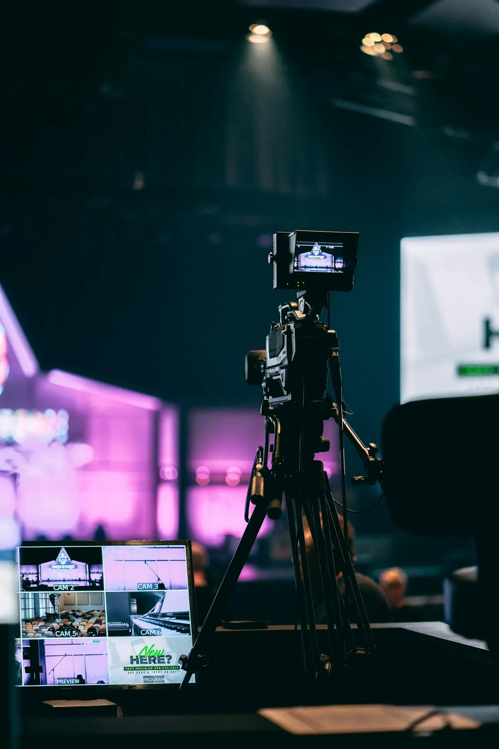 Camera on a tripod in a studio