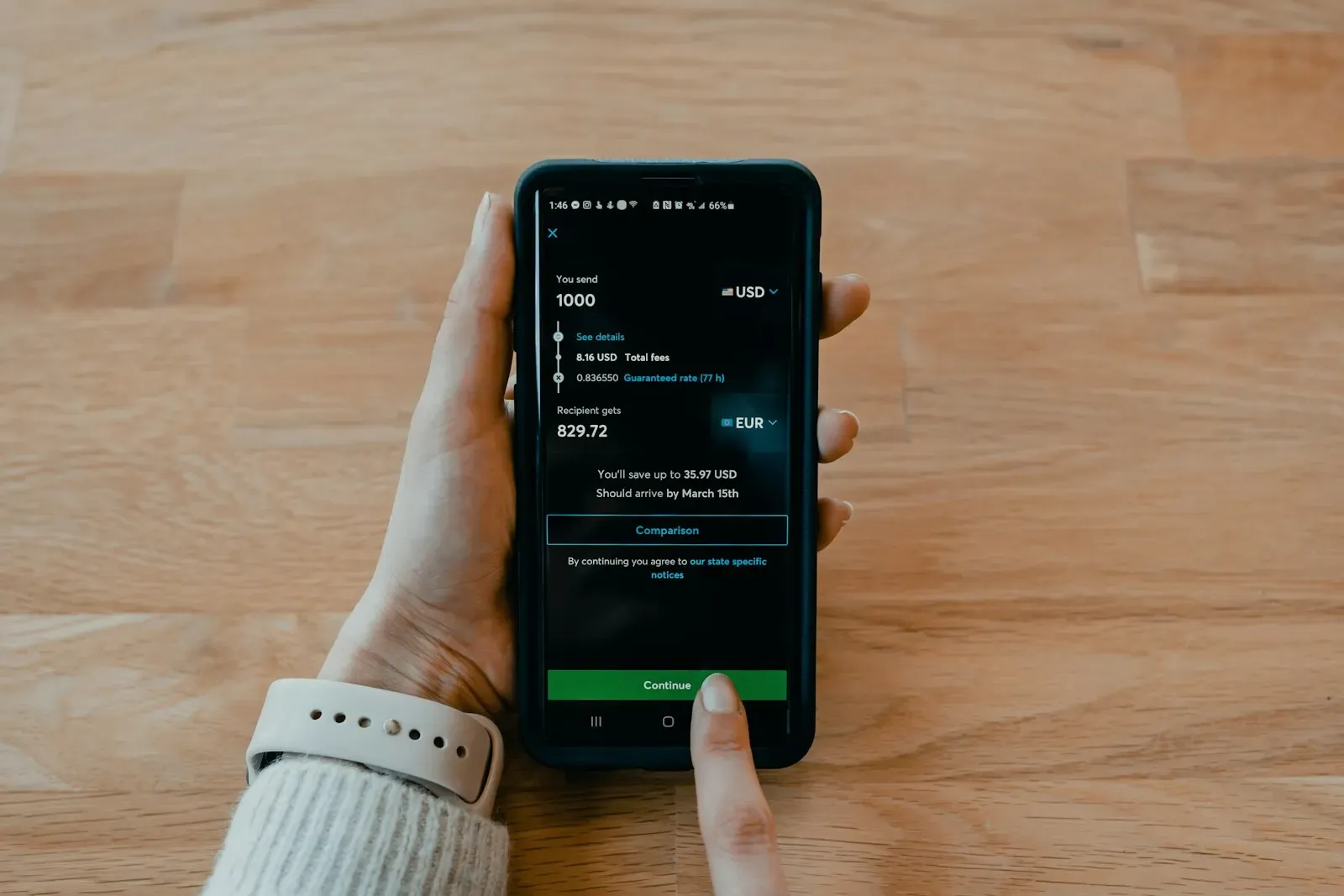 Person holding a phone with a shopping app open
