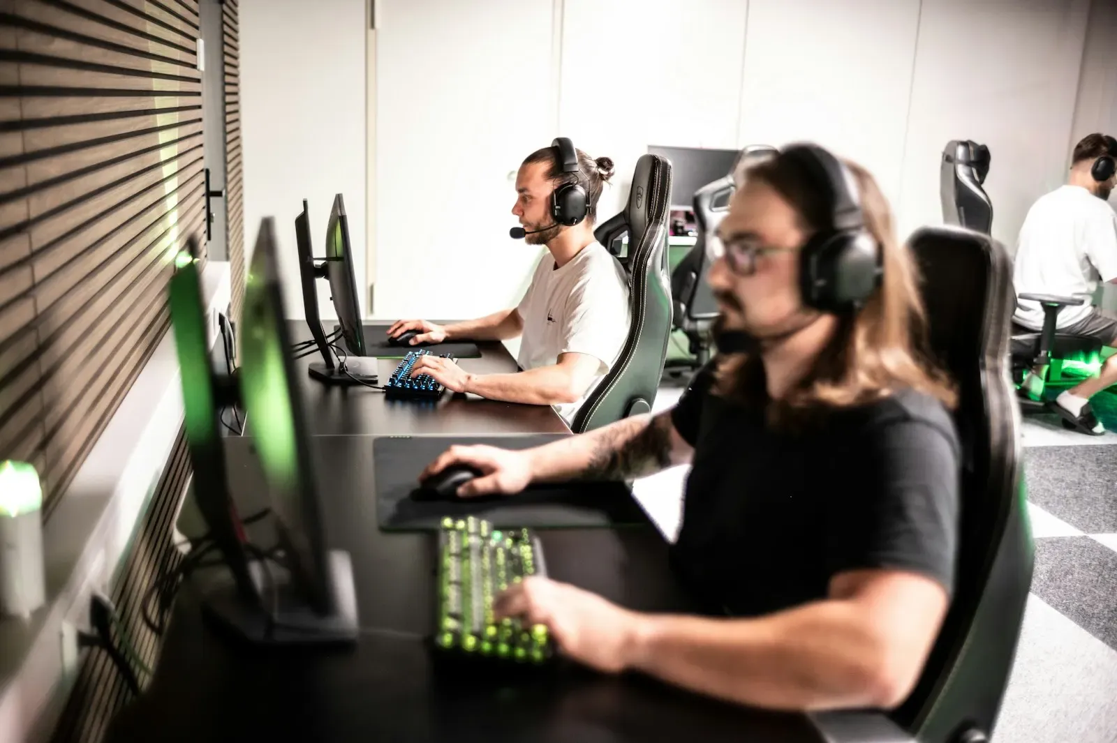 Agents with headsets at their desks