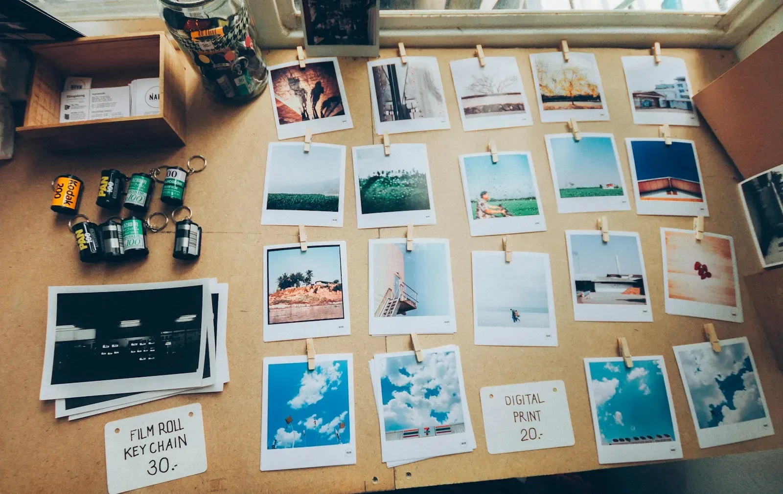 Printed photos laid out on a table