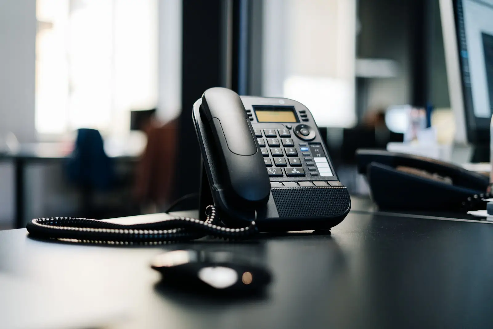 Office desk phone ready for support calls