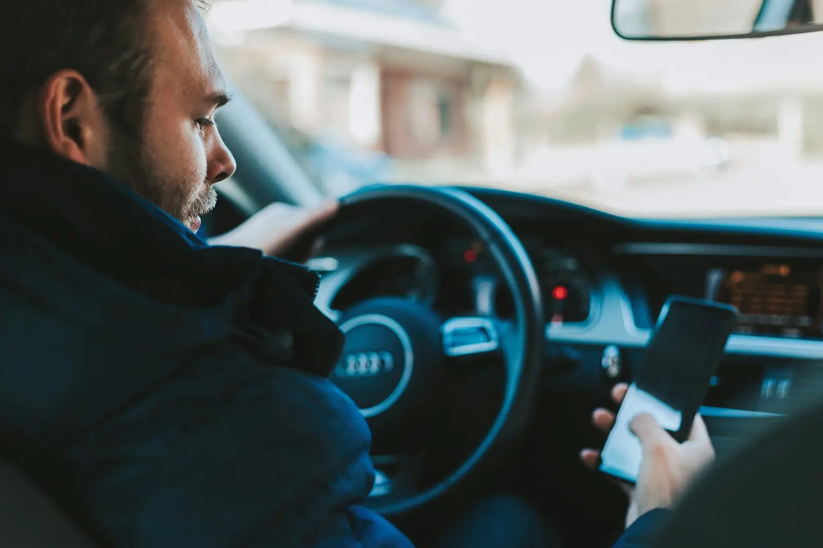 Man answering a call on his smartphone