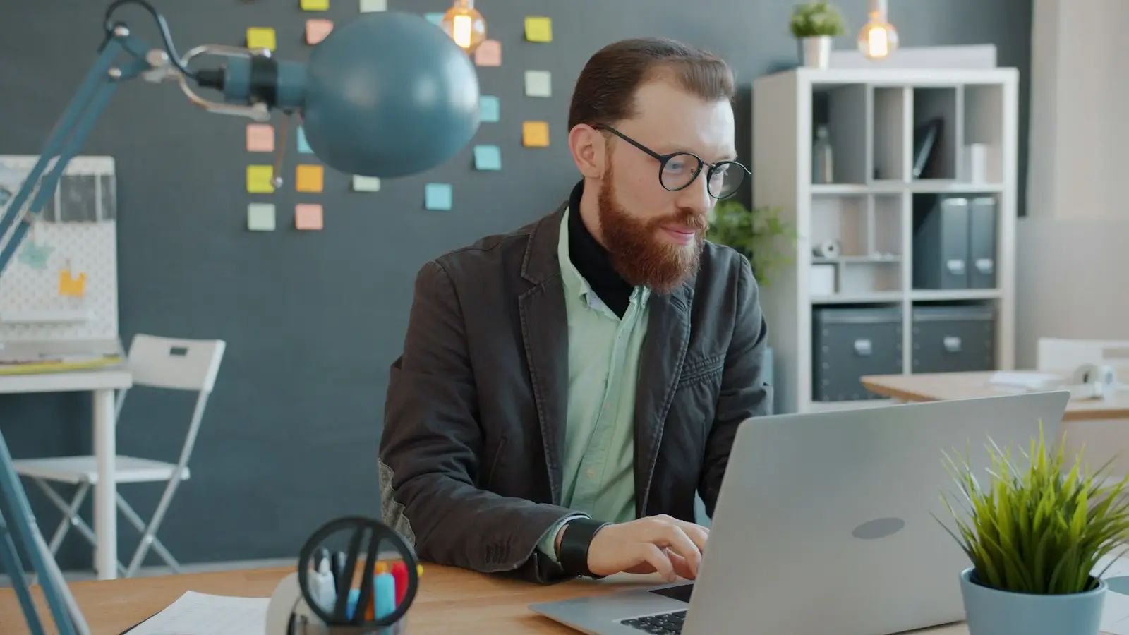 Agent reviewing call notes on a laptop